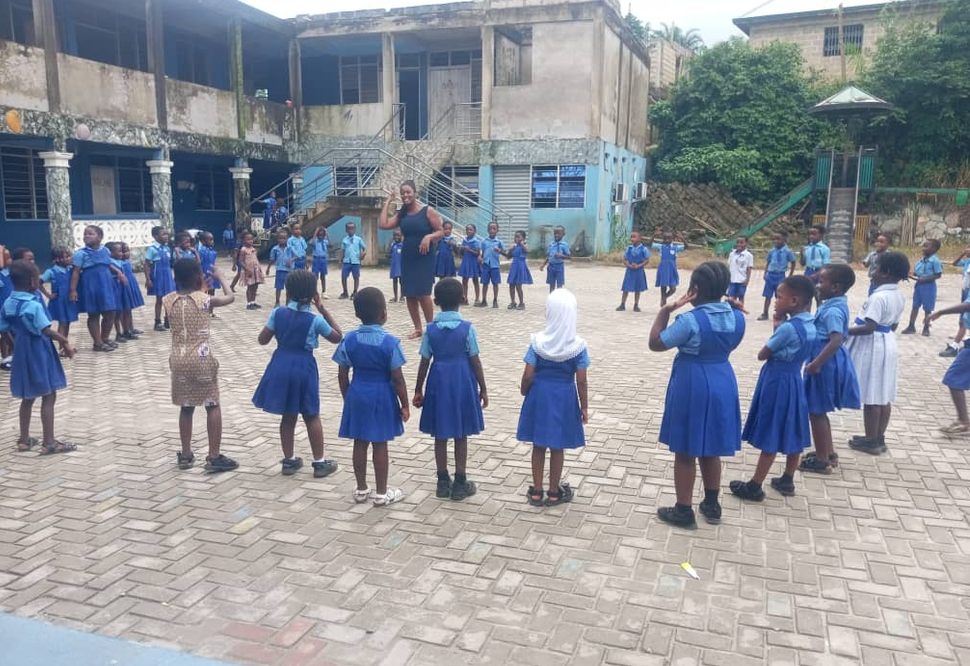 Pupils taking part in an outdoor school activity